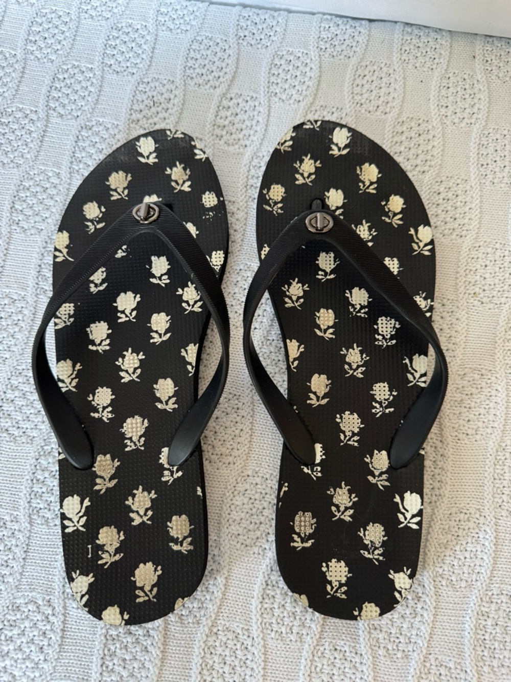 Coach Alyssa black floral flip flops